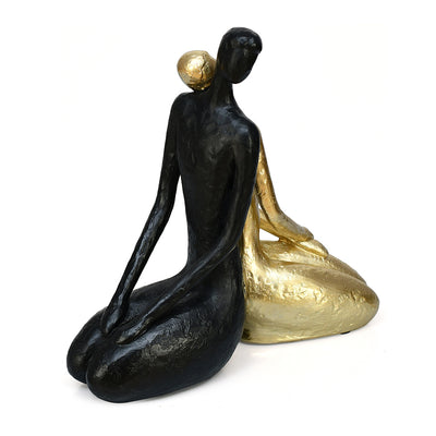 Sitting Couple Decorative Polyresin Showpiece (Black & Gold)