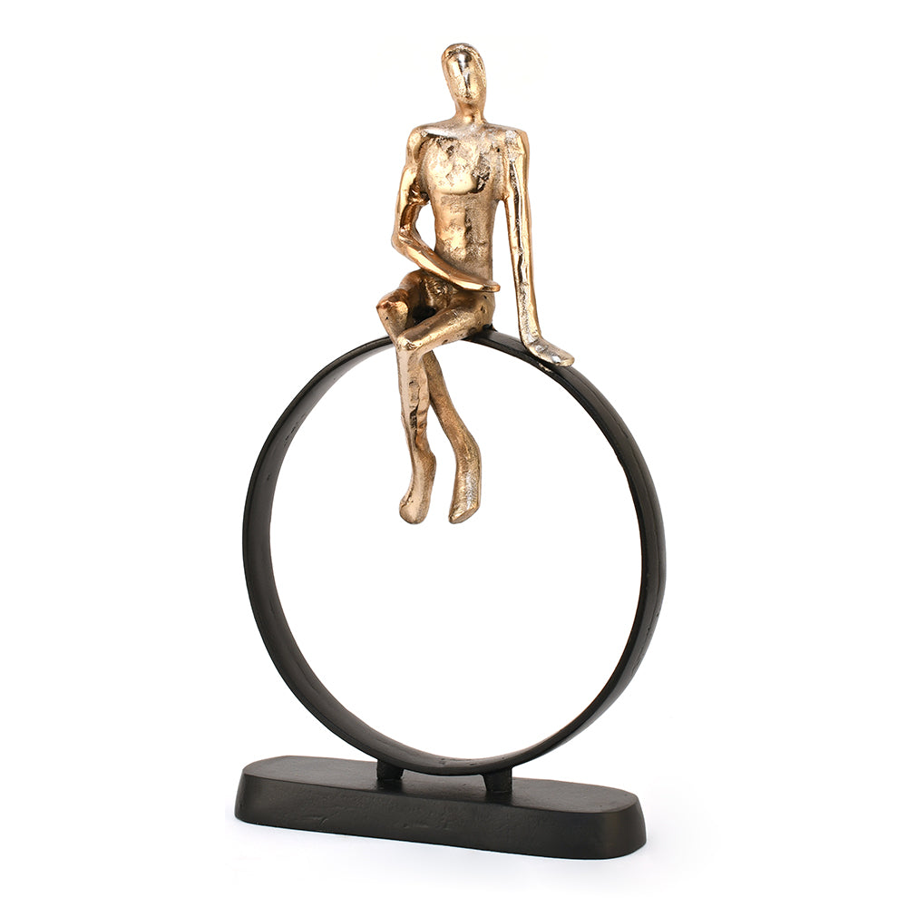 Man Sitting On Cirque Decorative Metal Showpiece (Black & Gold)