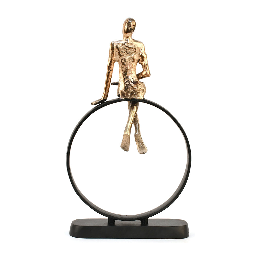 Man Sitting On Cirque Decorative Metal Showpiece (Black & Gold)