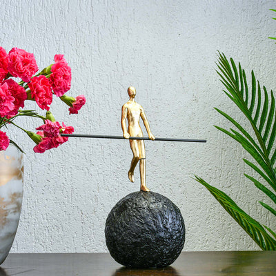 Balancing Man Decorative Polyresin Showpiece (Black & Gold)