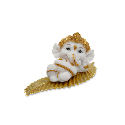 Ganesha On Leaf Polyresin Showpiece (White & Gold)
