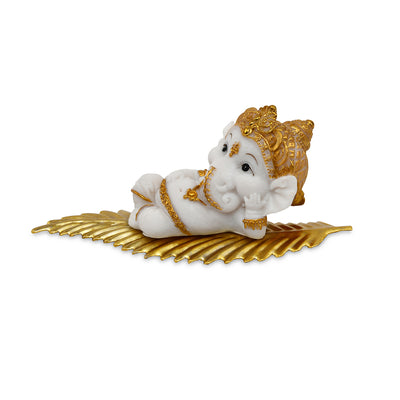 Ganesha On Leaf Polyresin Showpiece (White & Gold)